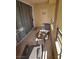 Relax and unwind on the private patio with comfortable seating, offering a peaceful outdoor space at 230 E Flamingo Rd # 129, Las Vegas, NV 89169