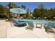 Well maintained pool with many lounge chairs and umbrellas, providing a place to relax and recreate at 230 E Flamingo Rd # 129, Las Vegas, NV 89169