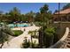 Scenic view of the pool and surrounding landscape, showcasing the community's beautiful outdoor amenities at 230 E Flamingo Rd # 129, Las Vegas, NV 89169