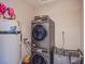 A modern laundry room featuring stacked washer and dryer units and a convenient laundry sorter at 237 Cervantes St, Las Vegas, NV 89101