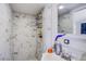 Modern shed bathroom featuring a marble-tiled shower and vanity at 237 Cervantes St, Las Vegas, NV 89101