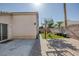 Great backyard setup with basketball hoop, easy-care artificial turf, and patio, ideal for entertainment at 2410 Morocco Ave, North Las Vegas, NV 89031