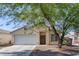 Charming single-story home with a well-maintained front yard and covered entrance at 2410 Morocco Ave, North Las Vegas, NV 89031