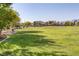 Expansive open field offers ample space for outdoor activities and community gatherings at 2410 Morocco Ave, North Las Vegas, NV 89031