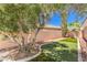 Inviting backyard featuring a basketball court and artificial turf at 27 Via Paradiso St, Henderson, NV 89011