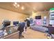 Bedroom features neutral carpet, ceiling fan, and small bed at 27 Via Paradiso St, Henderson, NV 89011