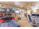 Spacious bedroom with shelves, fan, and desk space at 27 Via Paradiso St, Henderson, NV 89011