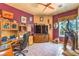 Comfortable living room with tile floors, window, and custom shelving and display at 27 Via Paradiso St, Henderson, NV 89011