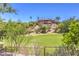 Scenic view of a lush green landscape and hillside home at 27 Via Paradiso St, Henderson, NV 89011
