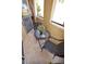 View of the cozy balcony area, complete with a table and two chairs, ideal for relaxation at 270 E Flamingo Rd # 319, Las Vegas, NV 89169