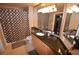 Well-lit bathroom with stylish tile and fixtures, including a shower with a patterned curtain at 270 E Flamingo Rd # 319, Las Vegas, NV 89169