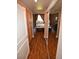 Hallway view with a view of the bedroom featuring modern furnishings and a private balcony at 270 E Flamingo Rd # 319, Las Vegas, NV 89169