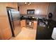 Well-equipped kitchen with stainless steel appliances, granite countertops, and ample cabinet space at 270 E Flamingo Rd # 319, Las Vegas, NV 89169