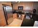 Functional kitchen featuring granite counters, stainless appliances, and ample storage space at 270 E Flamingo Rd # 319, Las Vegas, NV 89169