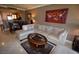 Charming living area offers comfortable seating, stylish accents, and open access to the kitchen at 270 E Flamingo Rd # 319, Las Vegas, NV 89169