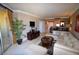 Bright living room showcases open floorplan with a comfortable seating area and sliding doors at 270 E Flamingo Rd # 319, Las Vegas, NV 89169