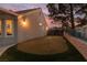 Scenic backyard with an artificial putting green and elegant landscaping at 2816 Golfside Dr, Las Vegas, NV 89134