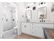 Bright, double sink bathroom with sleek shower and modern fixtures at 2816 Golfside Dr, Las Vegas, NV 89134