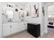 Bright, double sink bathroom with modern fixtures and decor at 2816 Golfside Dr, Las Vegas, NV 89134