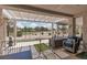 Inviting covered patio with serene golf course views and comfortable seating at 2816 Golfside Dr, Las Vegas, NV 89134