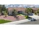 Charming single-story home with well-maintained landscaping, desert rock, and palm trees at 2816 Golfside Dr, Las Vegas, NV 89134