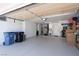 Spacious garage with storage cabinets, utility sink, and epoxy flooring at 2816 Golfside Dr, Las Vegas, NV 89134