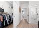 Hallway leads to a walk-in closet and a fully tiled shower at 2816 Golfside Dr, Las Vegas, NV 89134