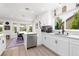 Spacious open kitchen flows into the dining area and features new stainless appliances at 2816 Golfside Dr, Las Vegas, NV 89134