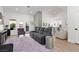 Spacious living room with vaulted ceilings, tiled fireplace, and hardwood floors at 2816 Golfside Dr, Las Vegas, NV 89134
