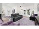 Inviting living room featuring hardwood floors, ample seating, and bright natural light at 2816 Golfside Dr, Las Vegas, NV 89134