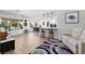 Bright and airy living area featuring hardwood floors, a breakfast bar, and casual dining at 2816 Golfside Dr, Las Vegas, NV 89134