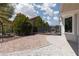 Fully fenced side yard with desert landscaping, offering privacy and serene outdoor space at 2816 Golfside Dr, Las Vegas, NV 89134
