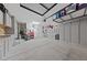 Spacious garage featuring built-in cabinets, storage, and ample room for vehicles and projects at 2816 High Range Dr, Las Vegas, NV 89134