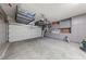 Well-organized garage with overhead storage racks, cabinets, and a clean, spacious area at 2816 High Range Dr, Las Vegas, NV 89134