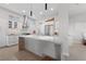 Kitchen with stainless steel appliances, a large island, and white cabinetry at 2816 High Range Dr, Las Vegas, NV 89134