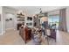 Bright living room features a fireplace, shelving, and sliding glass doors to the outside patio at 2816 High Range Dr, Las Vegas, NV 89134