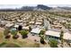 Expansive view of a residential neighborhood nestled against a backdrop of majestic mountains at 2816 High Range Dr, Las Vegas, NV 89134