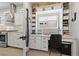 Bright, organized home office with custom built-ins, a window, and natural light at 2816 High Range Dr, Las Vegas, NV 89134