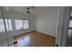 Empty bedroom with tile floors and natural light through window at 3020 Wilmington Way, Las Vegas, NV 89102
