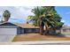 Charming single-story home showcasing a well-maintained yard and appealing curb appeal at 3020 Wilmington Way, Las Vegas, NV 89102