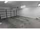Spacious two car garage with white walls and ceiling and plenty of room for storage and easy access at 3020 Wilmington Way, Las Vegas, NV 89102