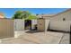 Private backyard featuring concrete, storage sheds, secure gate, and block wall at 3112 Haddon Dr, Las Vegas, NV 89134