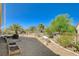 Expansive backyard featuring desert landscaping, raised garden beds, and mountain views at 3112 Haddon Dr, Las Vegas, NV 89134
