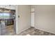 View of a dining area with gray cabinets, tile flooring and a view of the outside at 3112 Haddon Dr, Las Vegas, NV 89134