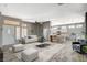 Spacious living room with stylish furniture, wood-look floors, and abundant natural light at 3112 Haddon Dr, Las Vegas, NV 89134