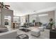 Inviting living room featuring a cozy fireplace, plush seating, and an open layout at 3112 Haddon Dr, Las Vegas, NV 89134