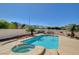 Sparkling backyard pool with an attached spa, surrounded by a spacious concrete patio at 3112 Haddon Dr, Las Vegas, NV 89134