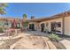 Relaxing backyard patio features a covered area, outdoor seating, and a covered spa at 3158 La Luna Cir, Henderson, NV 89014