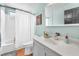 Bright bathroom with a tub-shower, single vanity, and updated fixtures in a cozy space at 3158 La Luna Cir, Henderson, NV 89014