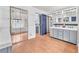 Bathroom featuring double sinks, mirrored closet doors, and soaking tub at 3158 La Luna Cir, Henderson, NV 89014